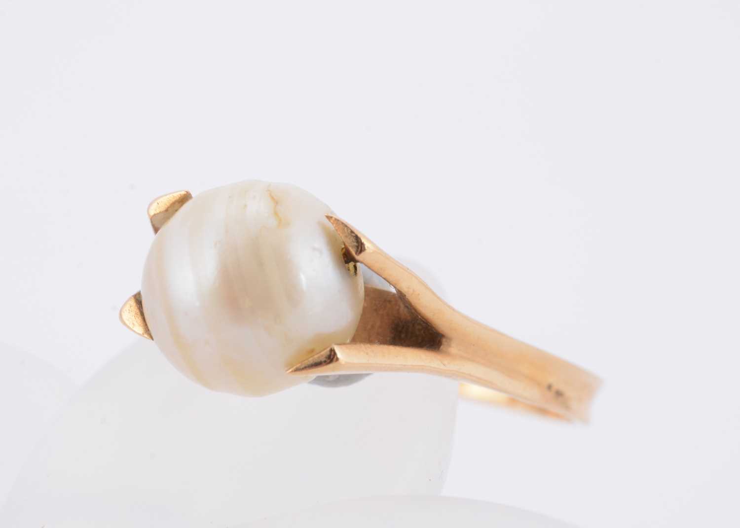 Lot 58 - A continental marked yellow gold cultured pearl dress ring