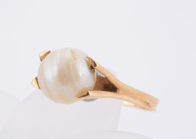 Lot 58 - A continental marked yellow gold cultured pearl dress ring