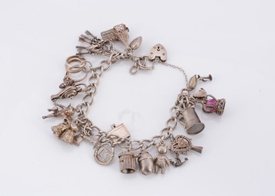Lot 61 - A silver charm bracelet