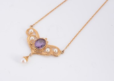 Lot 62 - A 9ct gold amethyst and seed pearl art nouveau style pendant