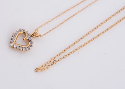 Lot 64 - A 10ct gold diamond set heart pendant and chain