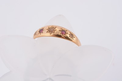 Lot 70 - An 18ct gold ruby and pearl dress ring