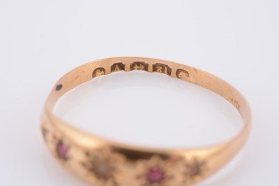 Lot 70 - An 18ct gold ruby and pearl dress ring