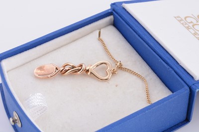 Lot 75 - A Clogau Welsh gold hallmarked love spoon on chain