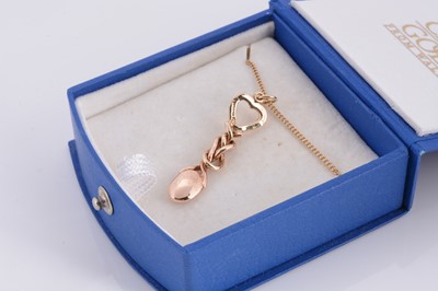 Lot 75 - A Clogau Welsh gold hallmarked love spoon on chain