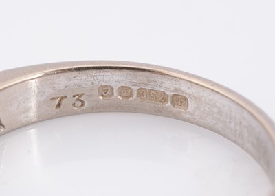 Lot 77 - An 18ct gold nine stone diamond half hoop eternity ring