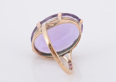 Lot 89 - A yellow metal amethyst dress ring