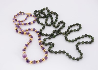 Lot 102 - An amethyst and gilt bead work necklace