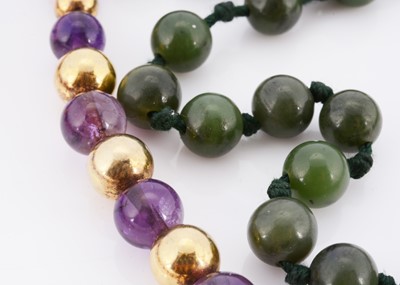 Lot 102 - An amethyst and gilt bead work necklace