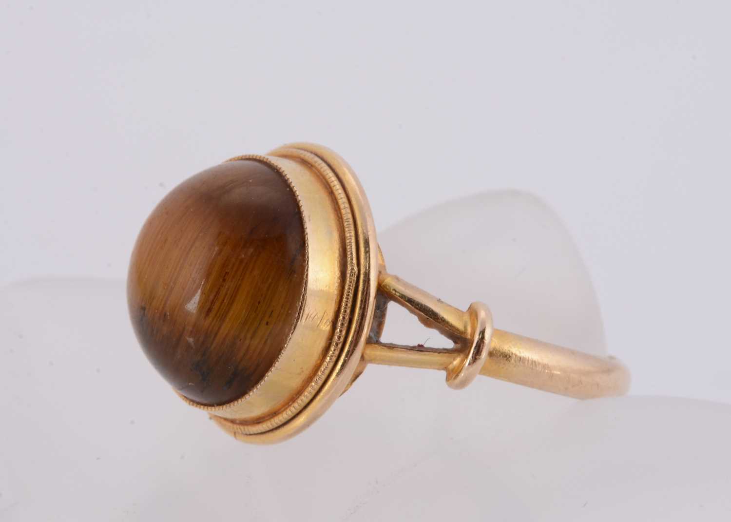 Lot 108 - A 14ct gold continental tiger's eye dress ring
