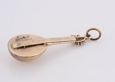 Lot 109 - A Fred of Paris Gaetan de Percin silver mandolin charm