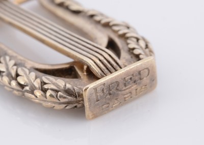 Lot 112 - A Fred of Paris Gaetan de Percin silver lyre charm