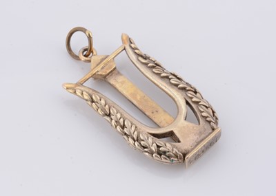 Lot 112 - A Fred of Paris Gaetan de Percin silver lyre charm