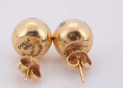 Lot 126 - A pair of Tiffany & Co 18ct gold platinum and diamond set Etoile ear studs