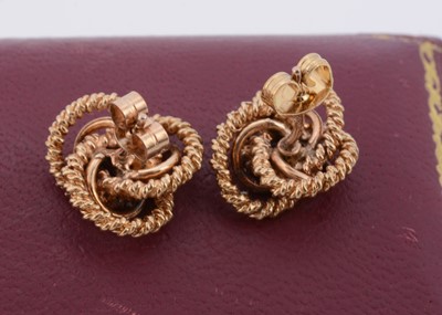 Lot 135 - A pair of cased textured knot 9ct gold earrings