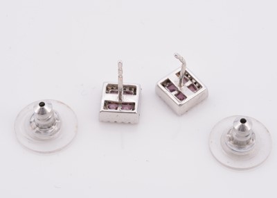 Lot 137 - A pair of 18ct gold pink sapphire and diamond set square stud earrings