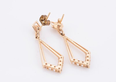 Lot 150 - A pair of yellow metal and diamond set chevron shaped earrings