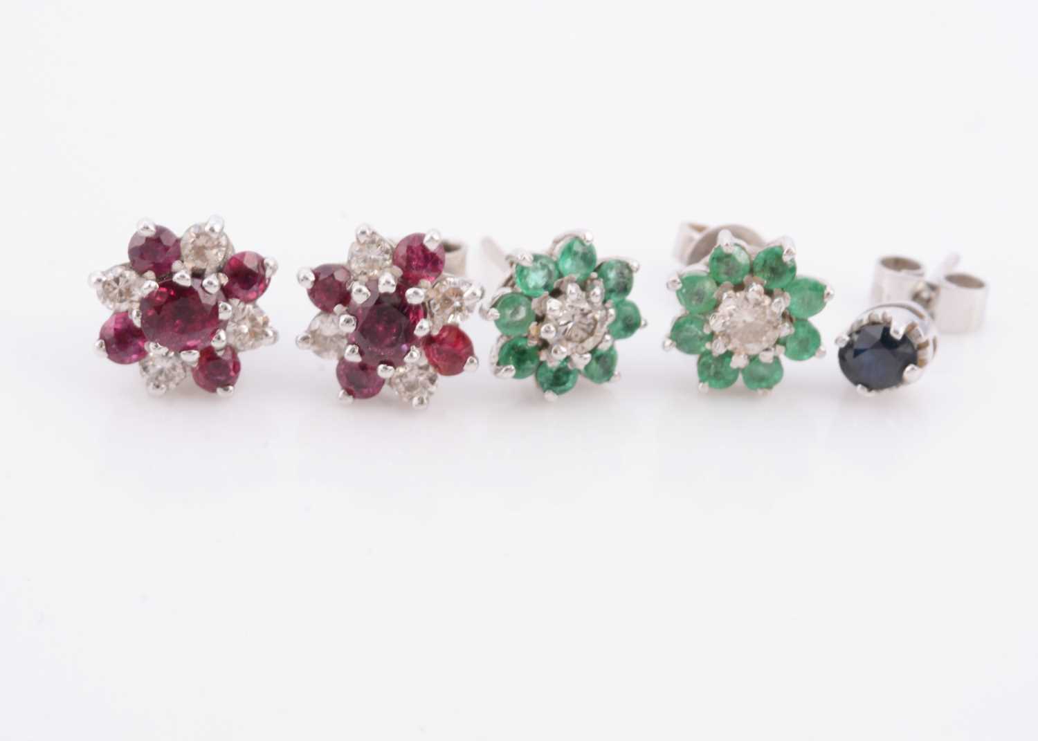 Lot 151 - Two pairs of gem set cluster earrings