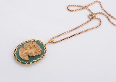 Lot 154 - A large 9ct gold and chalcedony cameo style pendant