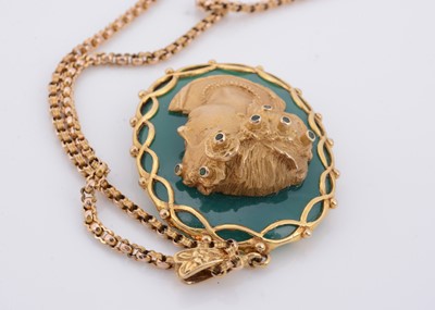 Lot 154 - A large 9ct gold and chalcedony cameo style pendant