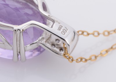 Lot 156 - An amethyst and diamond pendant and chain