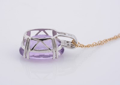 Lot 156 - An amethyst and diamond pendant and chain
