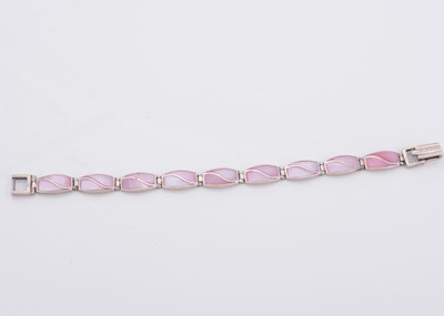 Lot 159 - A silver and pink stained mother of pearl line bracelet
