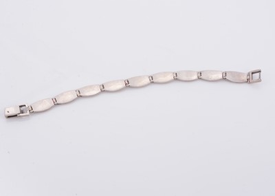 Lot 159 - A silver and pink stained mother of pearl line bracelet