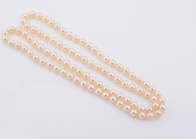 Lot 162 - A string of knotted cultured pearls