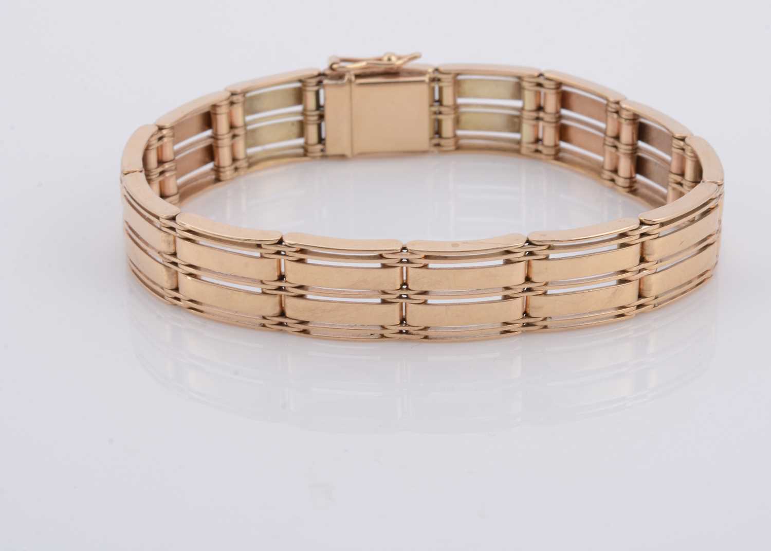 Lot 167 - A 9ct gold four bar flattened link bracelet