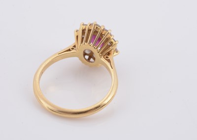 Lot 179 - An 18ct gold ruby and diamond cluster ring