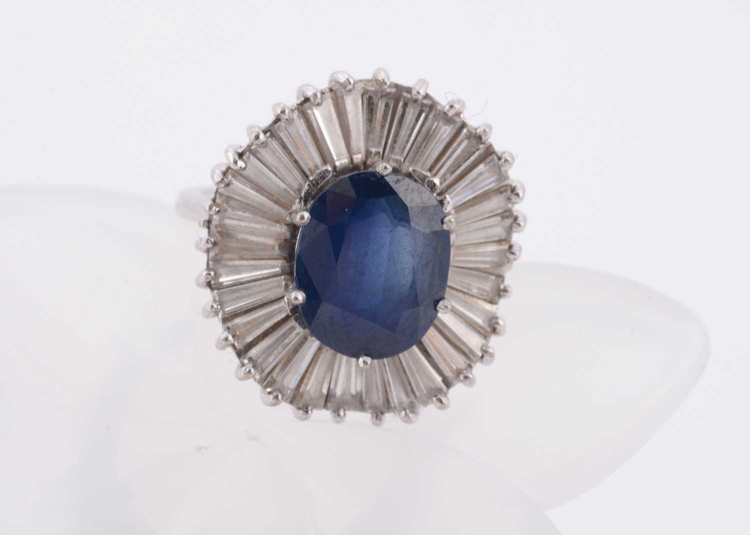 Lot 180 - A white gold sapphire and diamond dress ring