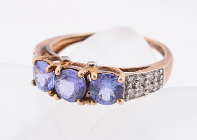 Lot 193 - A 9ct gold tanzanite and diamond dress ring