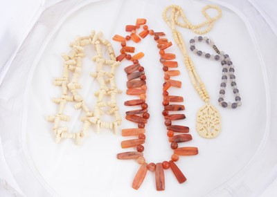 Lot 209 - A collection of hardstone , bone and African glass bead necklaces
