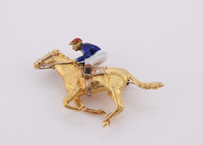 Lot 219 - An 18ct gold horse and jockey brooch