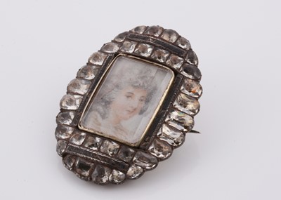 Lot 220 - An early 19th Century ivory portrait miniature