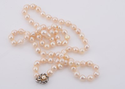 Lot 229 - A long string of Baroque cultured pearls