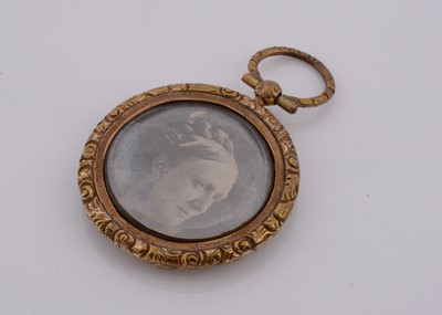 Lot 237 - A 19th Century gilt metal circular locket