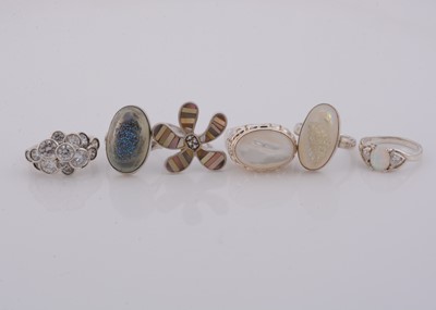 Lot 250 - A collection of five silver gem set dress rings