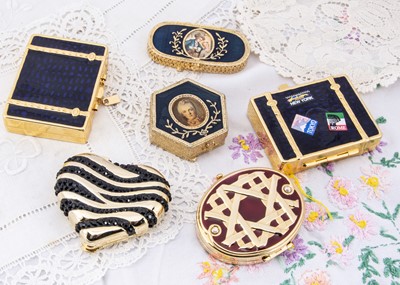 Lot 264 - Contemporary Estee Lauder coloured enamel compacts