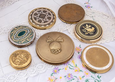 Lot 276 - A large circular gilt metal Dorothy Gray compact