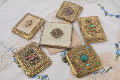 Lot 311 - Six 1930s Czechoslovakian gilt metal jewel mounted compacts