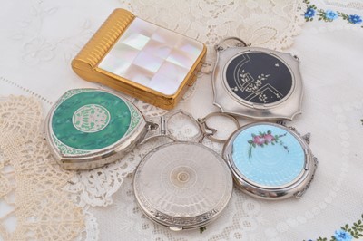 Lot 321 - Chromed 1920s Evans compacts