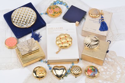 Lot 330 - Contemporary Estee Lauder compacts