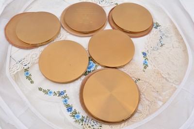 Lot 334 - Six 1940s Vogue Vanities gilt metal circular compacts