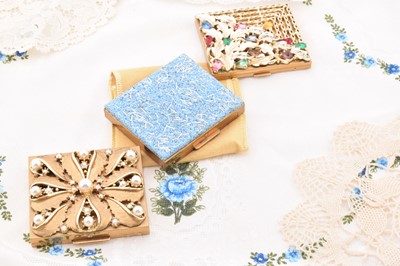Lot 345 - Three rectangular gilt metal American compacts