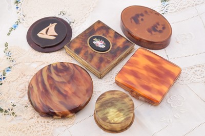 Lot 359 - A collection of 1930s and later faux tortoiseshell compacts