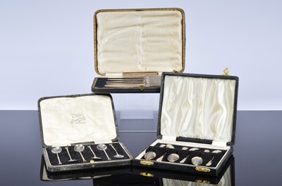 Lot 400 - A cased set of six silver coffee spoons and another set and a set of six silver handled butter knives