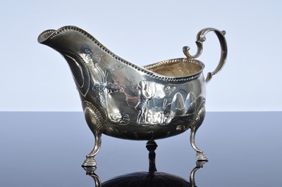 Lot 408 - A George III period Irish silver and later sauceboat