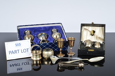 Lot 410 - A pair of 1960s silver liqueur goblets and three silver napkin rings